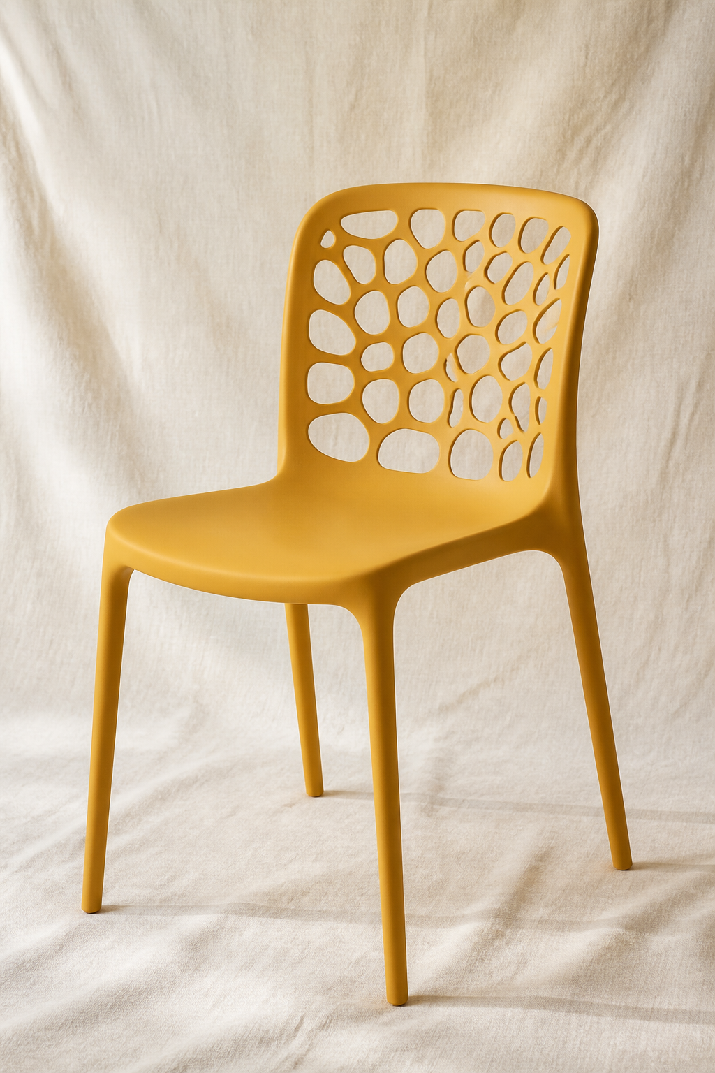 Yellow molded plastic cafe chair