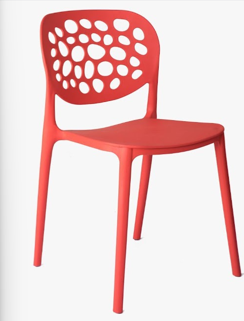 Red perforated molded plastic cafe chair