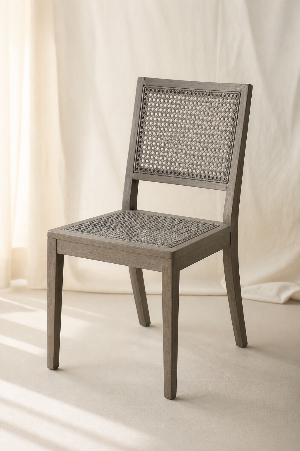 Grey woven rattan cane chair